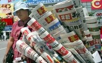 Chinese kranten, videos, radio en TV